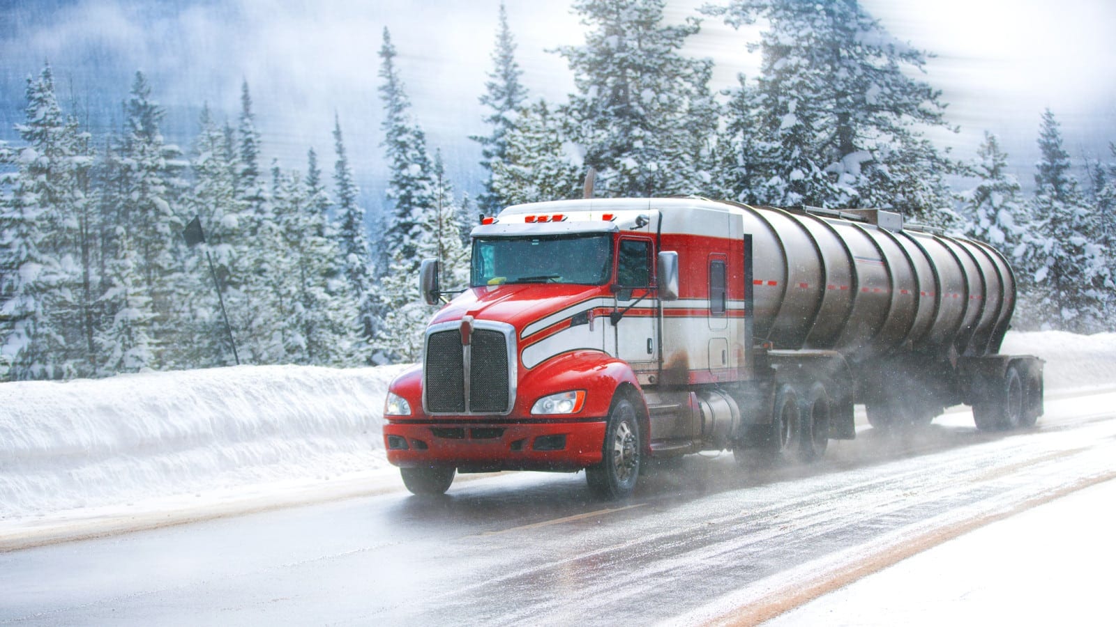 18-wheeler Truck Driving On An Icy Road Stock Photo