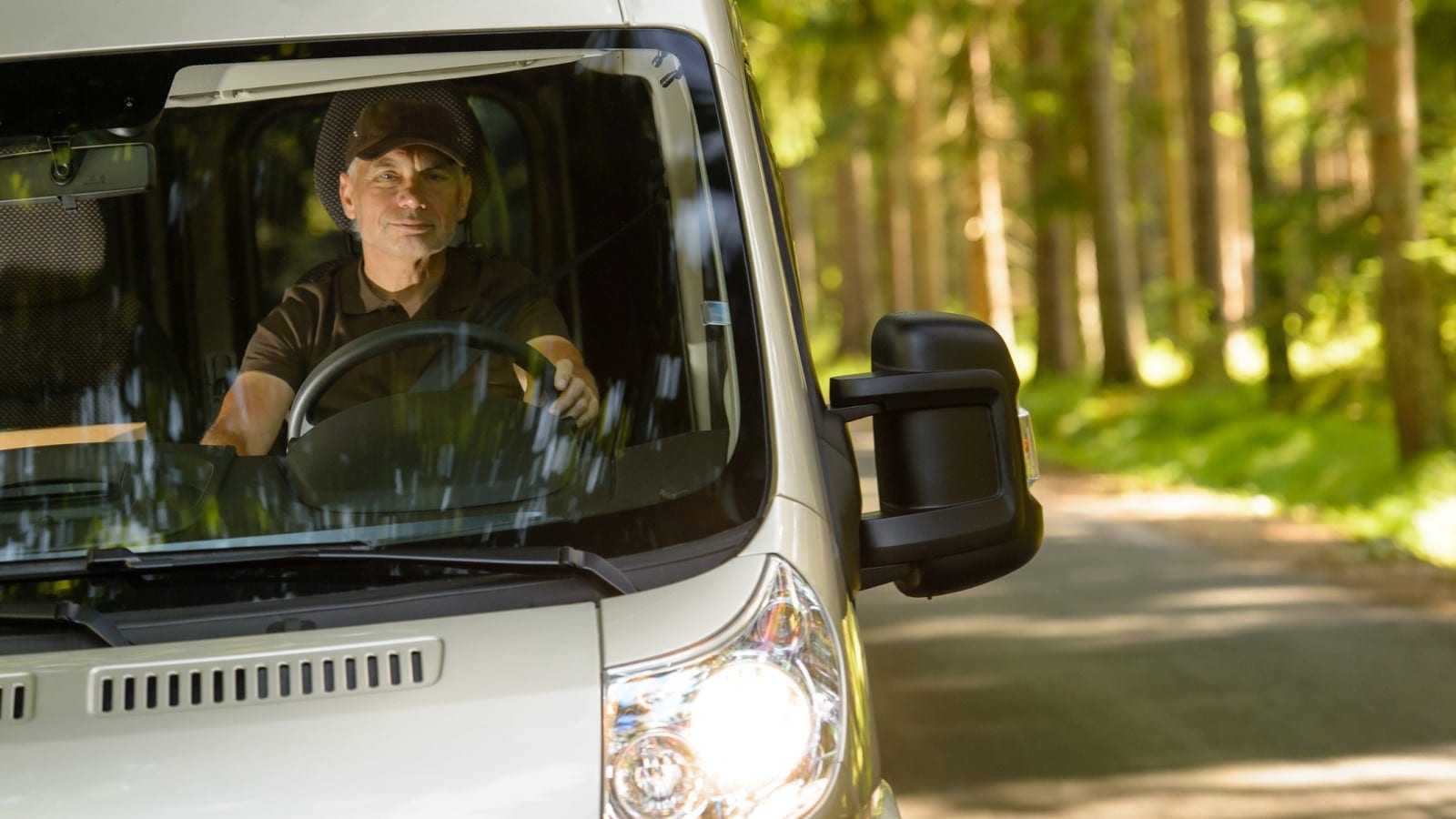 Delivery Driver Driving On A Rural Road Stock Photo