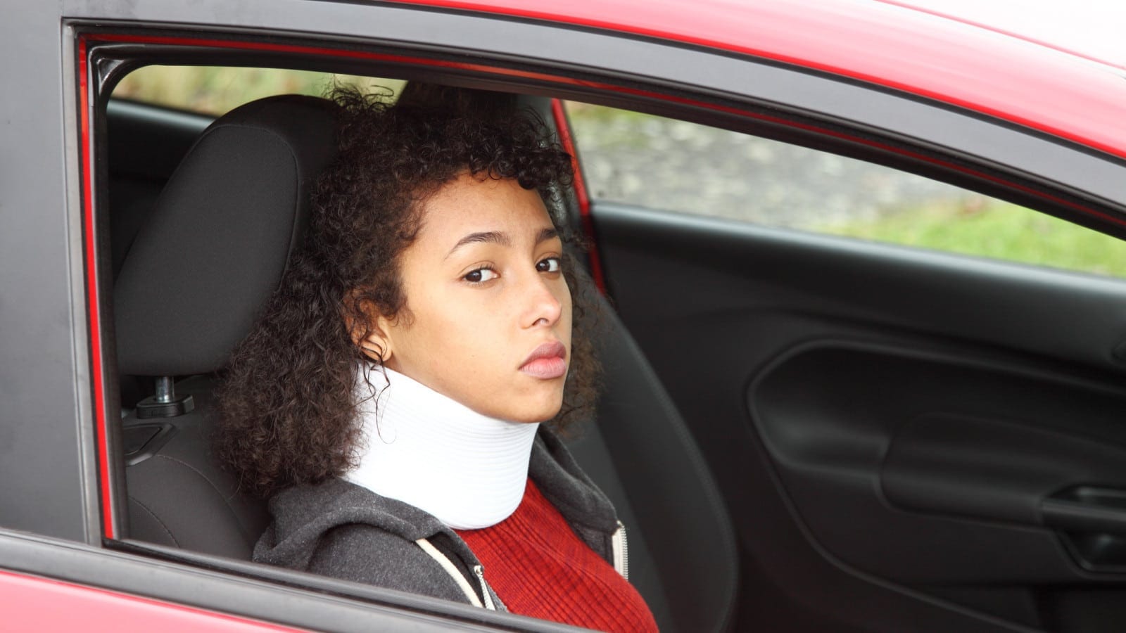 Young Woman In A Neck Brace Stock Photo