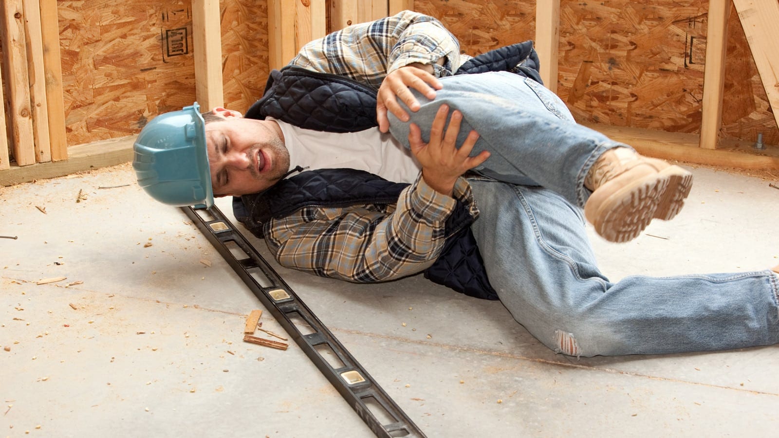 Construction Worker With A Knee Injury Stock Photo