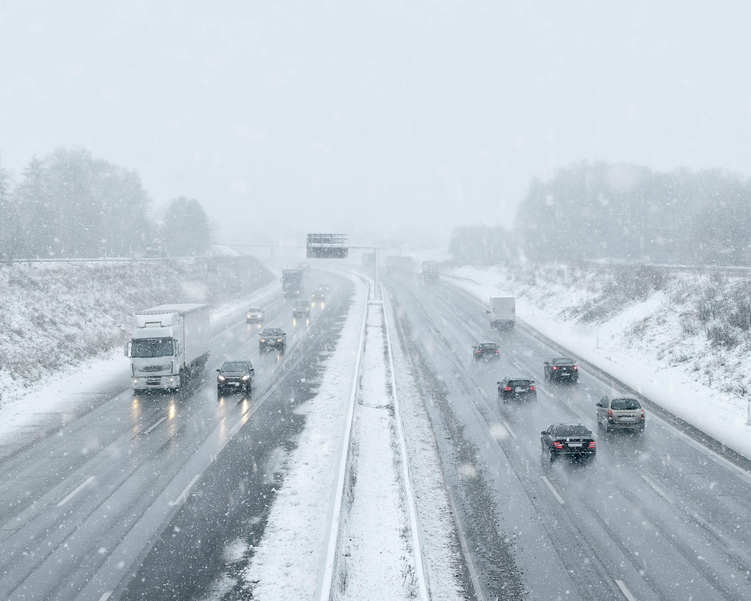 commuter traffic on a snowy highway