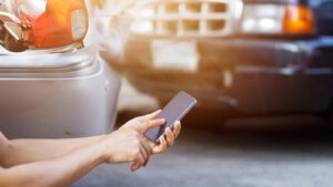 Man Reporting A Car Accident Stock Photo