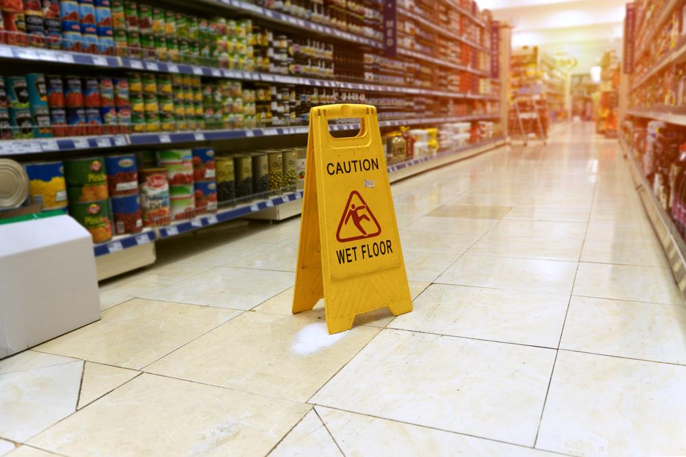 A wet floor sign in a grocery store may play a role in what happens if you slip and fall in a store.